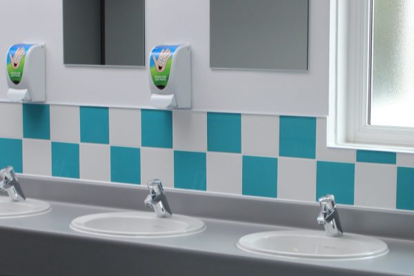 Primary School basins tiled splashback