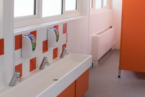 Primary school washroom troughs sinks